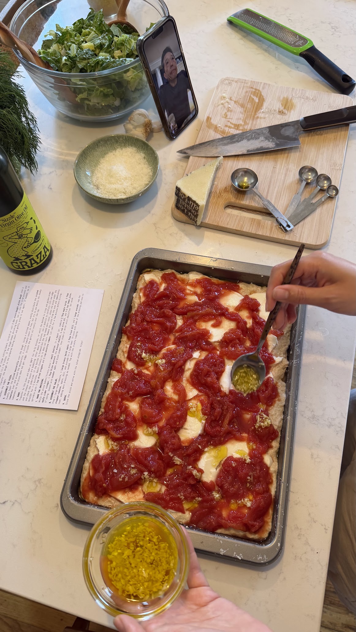 Preparing pizza together on a video call